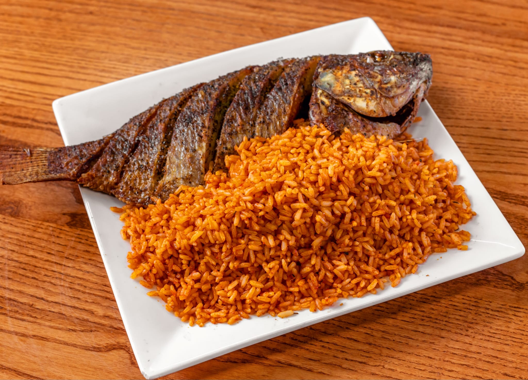 Fried Tilapia Fish & Jollof Rice
